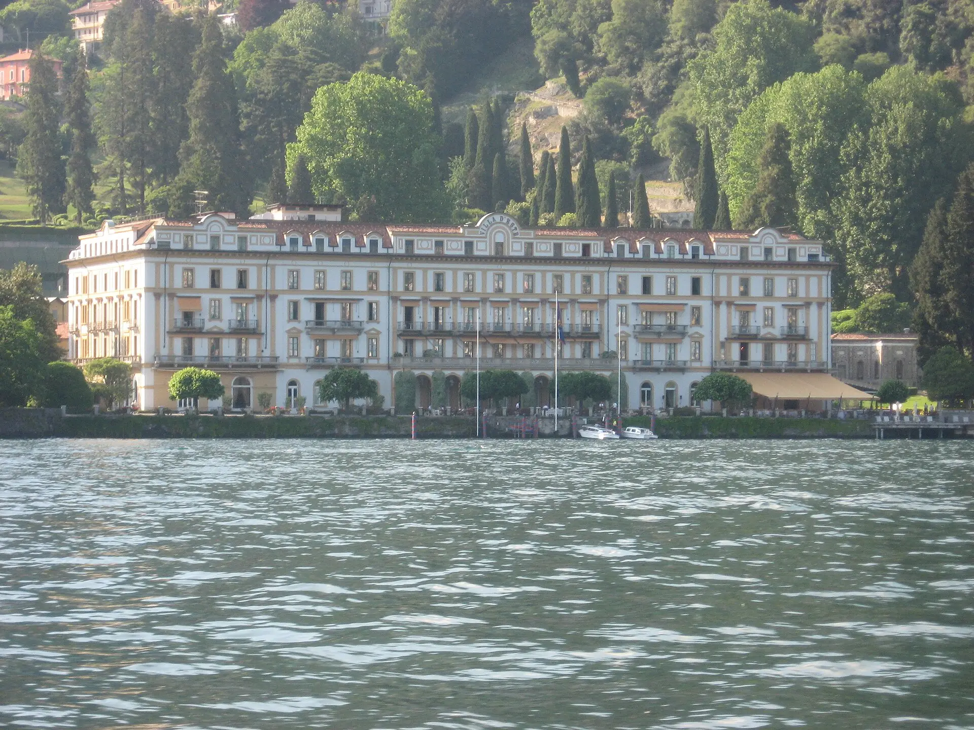 Cernobbio on Lake Como — Villa d'Este's grand white waterfront, seen from the lake.
